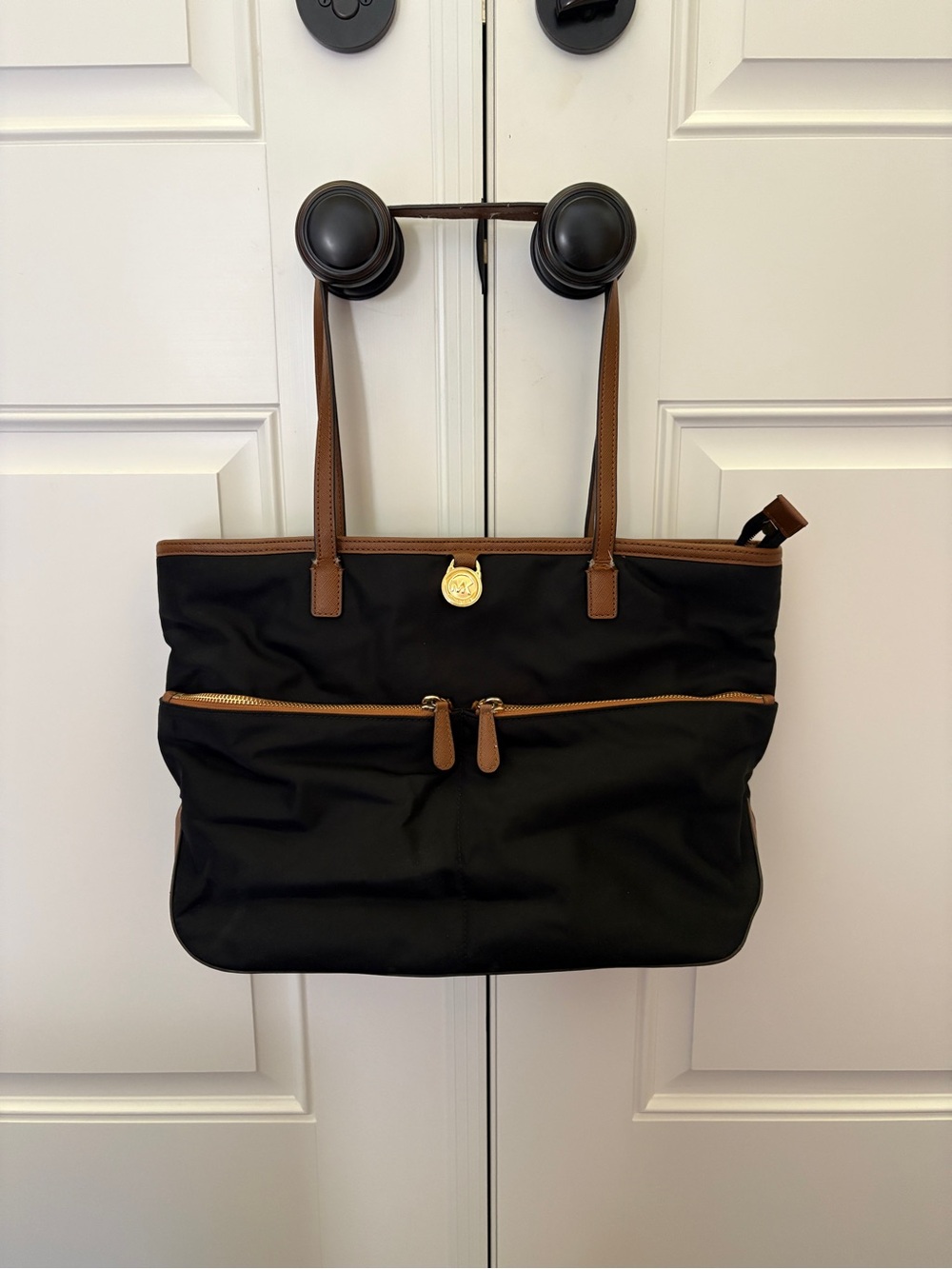 Michael Kors Black Tote with Brown Trim and Gold Accent